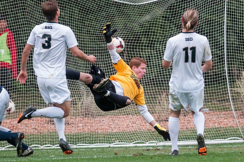 	<p>Sophomore goalkeeper Zach Bennett lets the winning goal past him during the game against Penn State on Oct. 20, 2013, at DeMartin Soccer Stadium. The Spartans fell to the Nittany Lions in double overtime, 1-2. Khoa Nguyen/The State News</p>