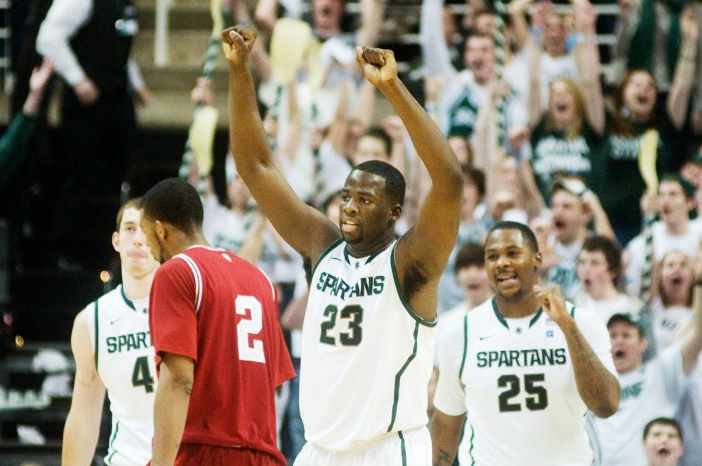 	<p>Junior forward Draymond Green and sophomore center Derrick Nix celebrate at the end of the second half on Sunday at Breslin Center. The Spartans&#8217; last-minute tie took the game into overtime, and <span class="caps">MSU</span> won with a final score of 84-83.</p>