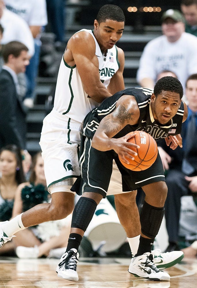 	<p>Freshman guard Gary Harris plays defense on Purdue guard Terone Johnson on Saturday, Jan. 5, 2012, at Breslin Center. <span class="caps">MSU</span> defeated Purdue 84-61 during the Spartans&#8217; Big Ten home opener. Adam Toolin/The State News</p>