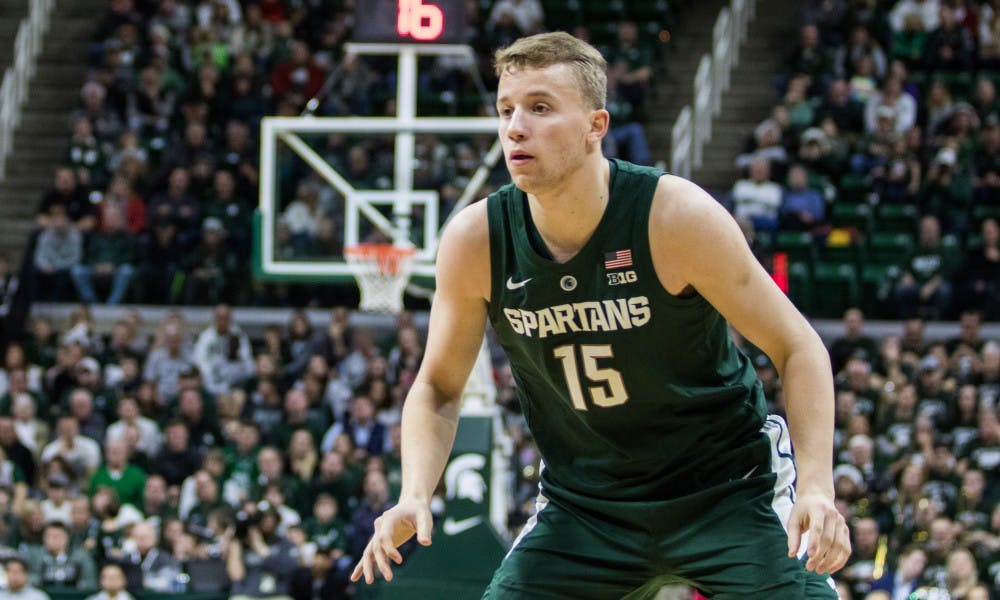 Freshman forward Thomas Kithier (15) waits for a pass during the game against Oakland University at Breslin Center on Dec. 21, 2018. The Spartans defeated the Grizzlies, 99-69.