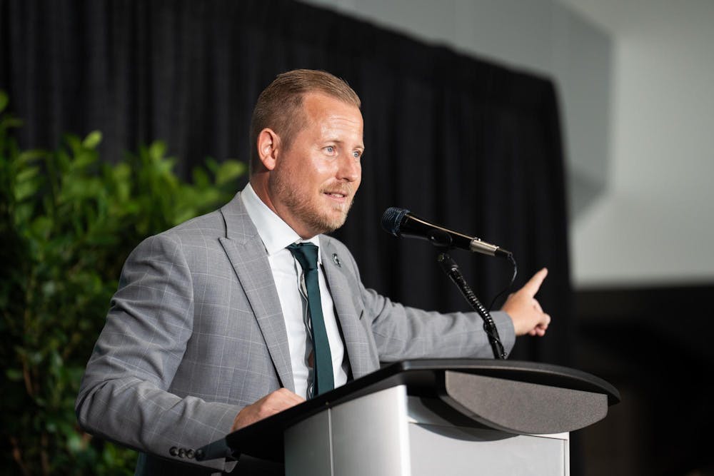 <p>Michigan State University's new vice president and athletic director, Dan Bartholomae, speaks at a press conference introducing him to the community at the Breslin Center in East Lansing, Mich., on Aug. 19, 2026.</p>