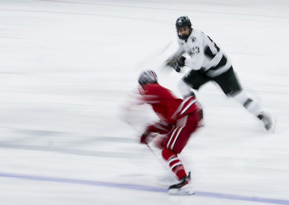 <p>MSU sophomore forward Shane Vansaghi (23) skates after the puck in the Munn Ice Arena on March 14, 2026.</p>