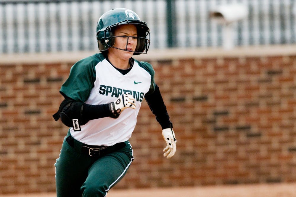 Junior outfielder Kylene Hopkins heads for first base after batting Thursday afternoon when Michigan State faced Butler at Secchia Stadium. The Spartans lost to the Bulldogs 8-1. Samantha Radecki/The State News