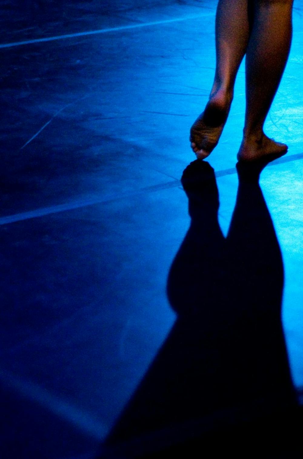 A dancer pauses during rehearsal for the MSU Orchesis Student Dance Concert Tuesday night at the Circle Theater. The biannual concert features the work of student choreographers, dancers, and directors. Matt Hallowell/The State News