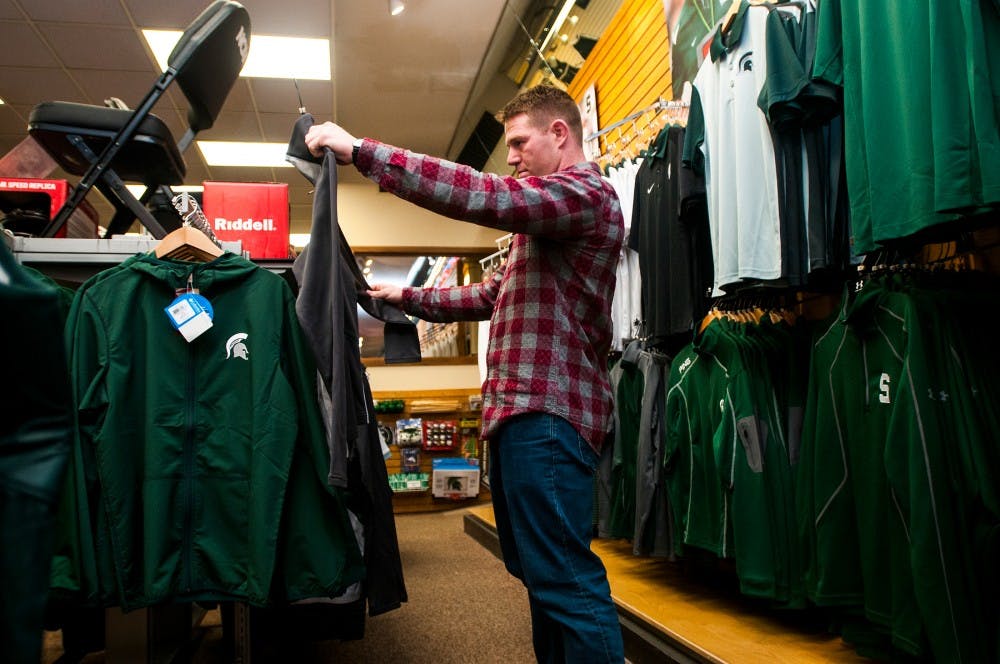 MSU Alumni Rex Kendele shops on March 23, 2016 at 421 E. Grand River. Kendele was in town visiting friends that live in the area. 