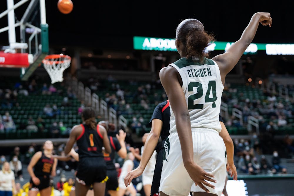 <p>Senior guard Nia Clouden (24) poses after a shot. MSU lost to Maryland at the Breslin Center 67-62 on Thursday, Feb. 3, 2022.</p>