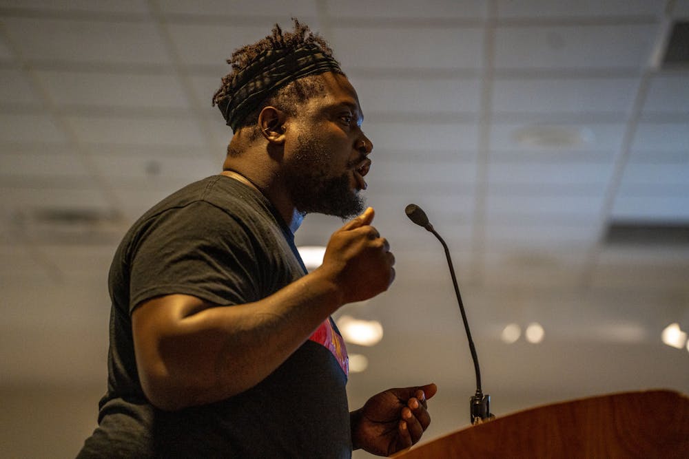 <p>Lansing resident Karrington Kelsey, 31, speaks during public comment of the East Lansing City Council meeting at the Hannah Community Center in East Lansing on Sept. 6, 2022. “I’m not here to yell or scream at you. I’m here to say you need to do better… If you choose to do nothing, you choose the bullets in DeAnthony VanAtten’s body,” Kelsey said. Those who commented on East Lansing policing focused on the shooting of DeAnthony VanAtten in April of this year.</p>