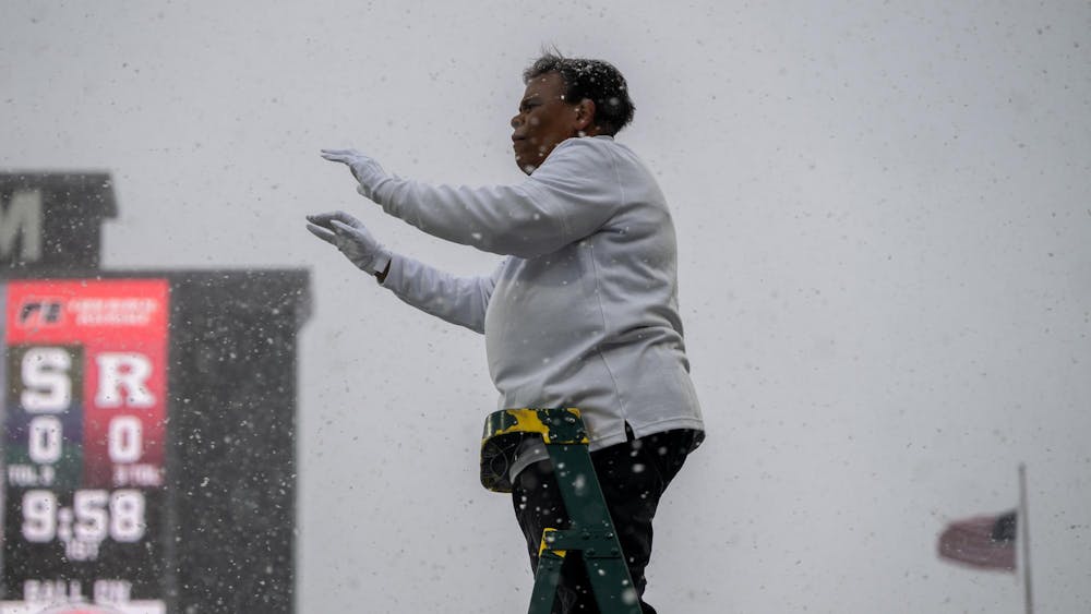 <p>Associate Director of the Spartan Marching Band Arris Golden while conducting before MSU vs. Rutgers football match at Spartan stadium on Nov. 30, 2024.</p>