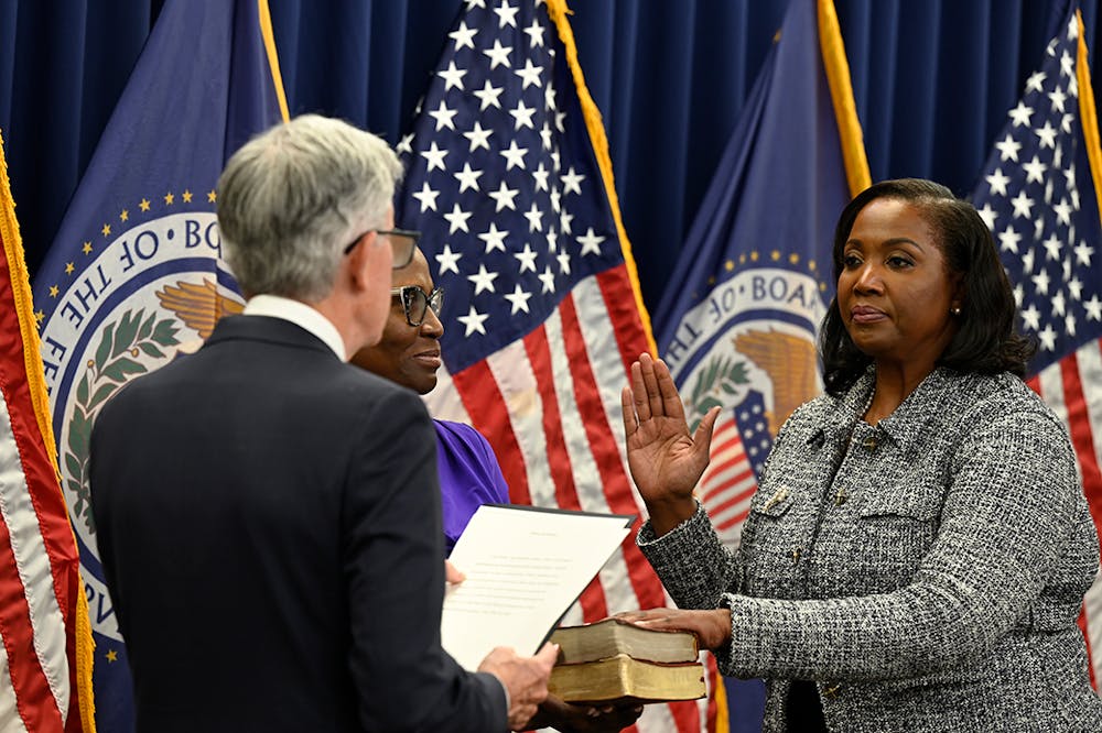 Chair Jerome H. Powell swears in Lisa D. Cook on May 23, 2022 as a member of the Board of Governors of the Federal Reserve System (Photo Courtesy of federalreserve.gov).