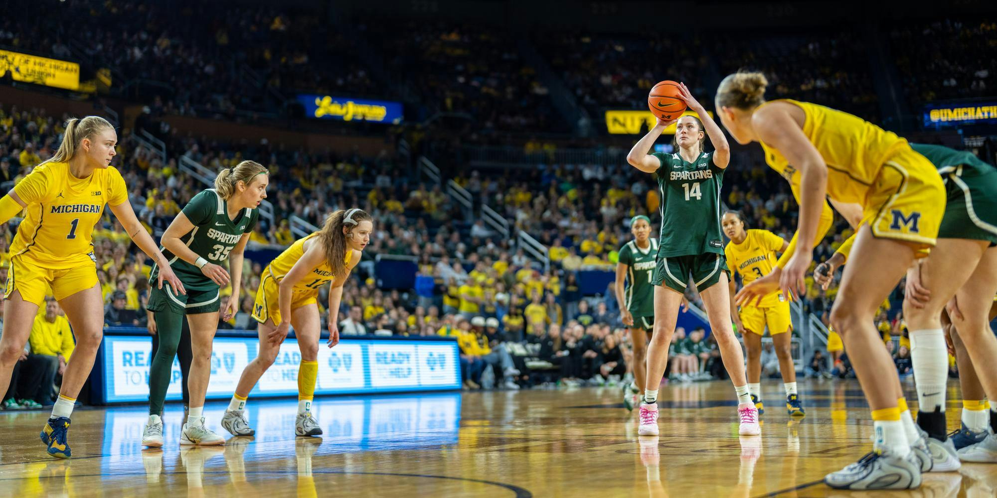 MSU Sr. F, Grace VanSlooten (14), shots a free throw in the Crisler Center in Ann Arbor, MI on Feb. 15, 2026.