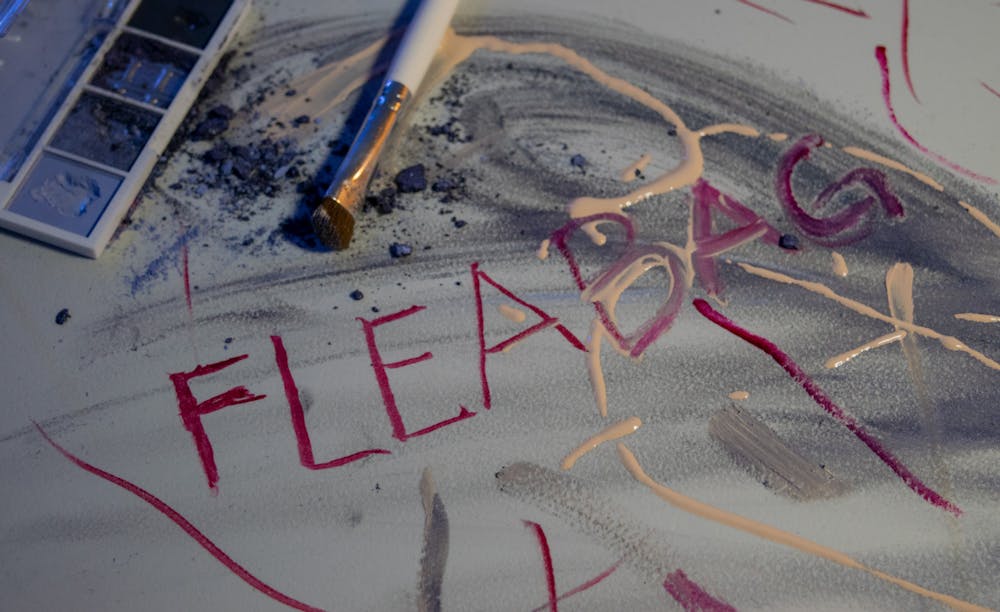 Fleabag is written on top of smeared makeup on a table. Feb. 16, 2022