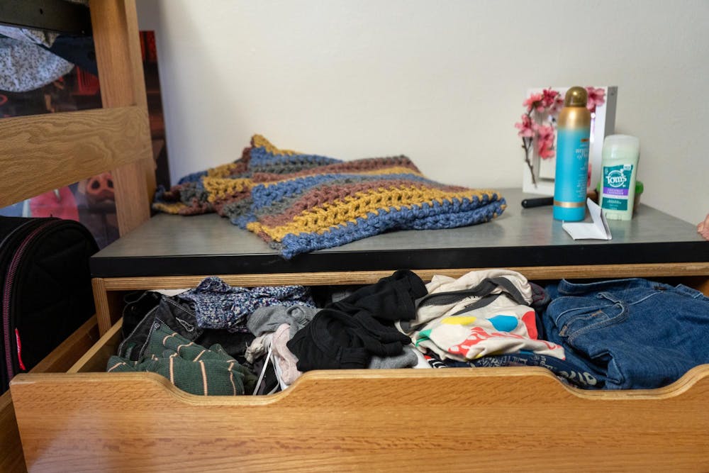 Clothes in a dresser in a dorm room in Yakeley Hall on Oct. 16, 2023.