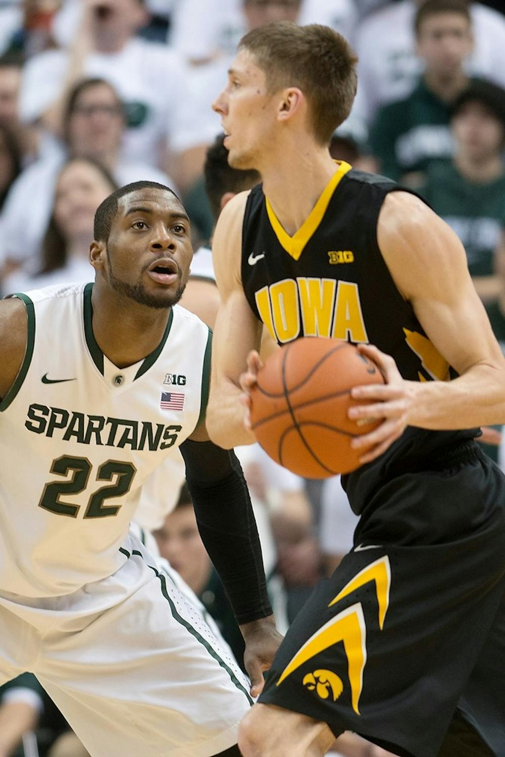 <p>Junior guard/forward Branden Dawson guards Iowa forward Jarrod Uthoff on March 6, 2014, at Breslin Center during the game against Iowa. The Spartans defeated the Hawkeyes, 86-76. Julia Nagy/The State News</p>