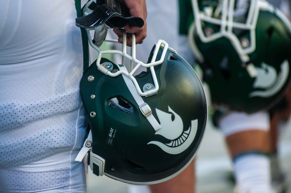 <p>A Spartan's helmet during the game against Utah State on Aug. 31 at Spartan Stadium. At halftime the Spartans were leading 20-14.</p>