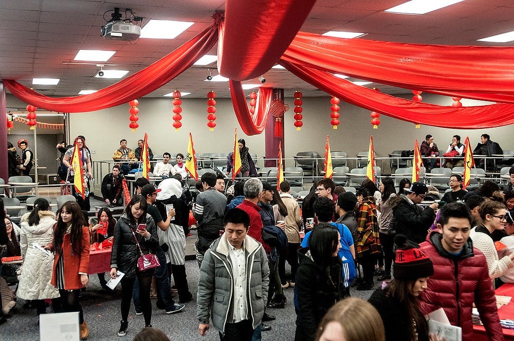 <p>Many people venture into the exhibit room Feb. 13, 2015, at the CSSA Chinese New Year Temple Fair held in C107 McDonel hall. The room holds many different booths with games for people to enjoy and an educational film was shown which celebrates Chinese culture. Allyson Telgenhof/The State  News.</p>