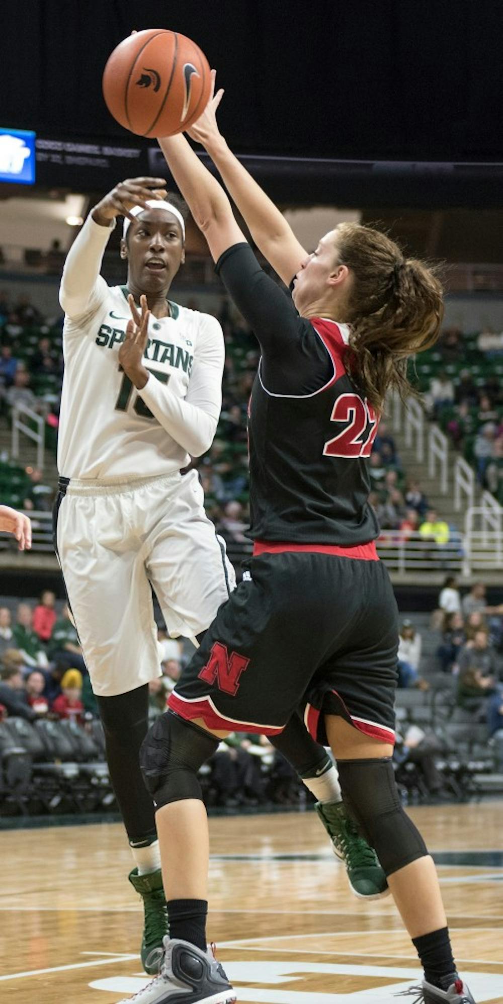 Red shirt freshman Victoria Gaines passes the ball to a teammate as she is defended by Nebraska center Allie Havers during the game against Nebraska on Jan. 7, 2017 at the Breslin Center. The Spartans defeated the Cornhuskers, 93-73.