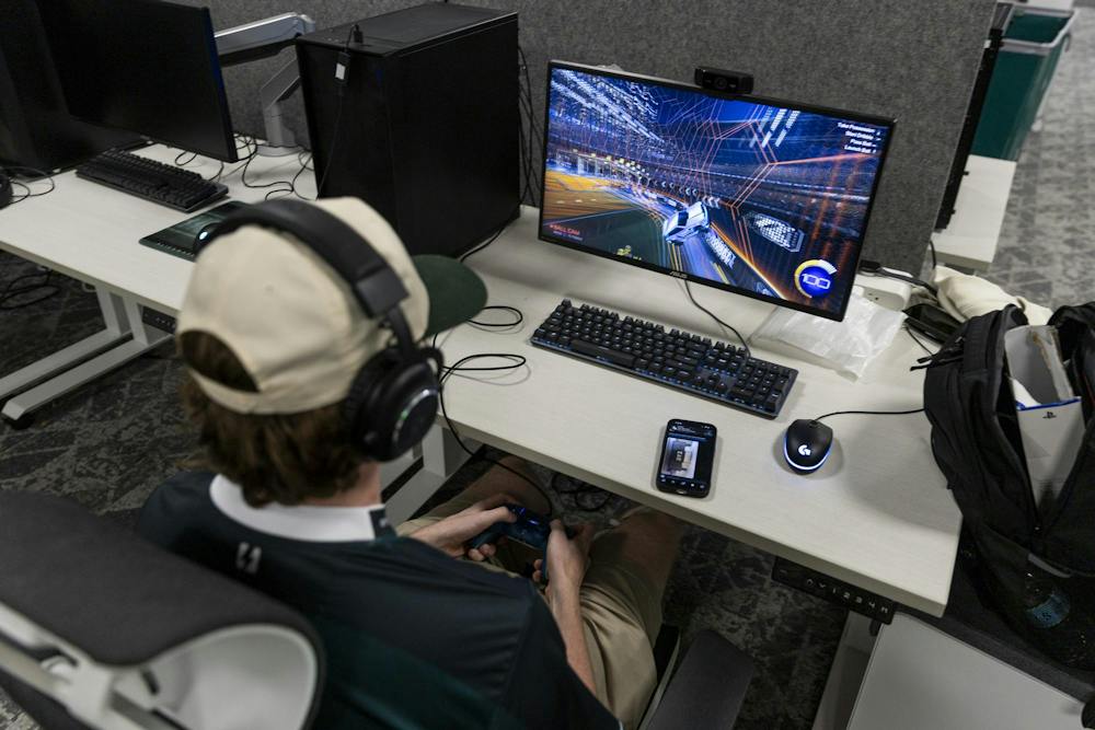 <p>Michigan State digital storytelling sophomore Christian Riegert plays Rocket League in the Hubbard Esports Gaming Hub in East Lansing, Mich., on Thursday, Sept. 17, 2026.</p>