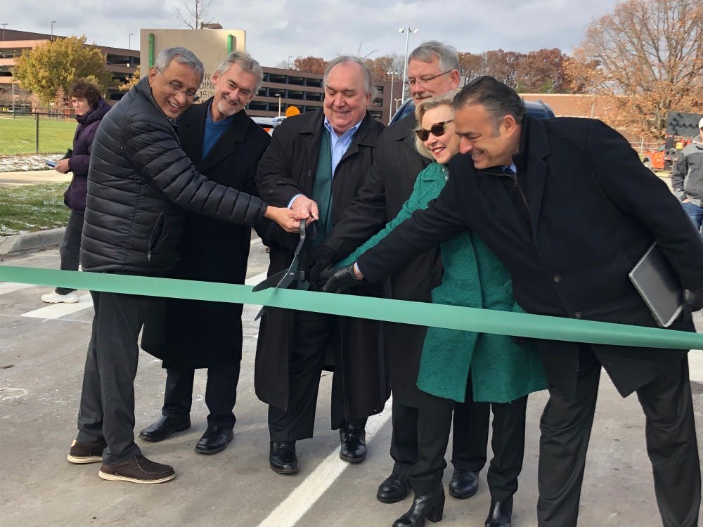 <p>From left to right: Satish Udpa, executive vice president for administrative services, Mayor Mark Meadows, City of East Lansing, Interim President John Engler, Mark Van Port Fleet and director, Michigan Department of Transportation, Melanie Foster, Board of Trustees.</p>