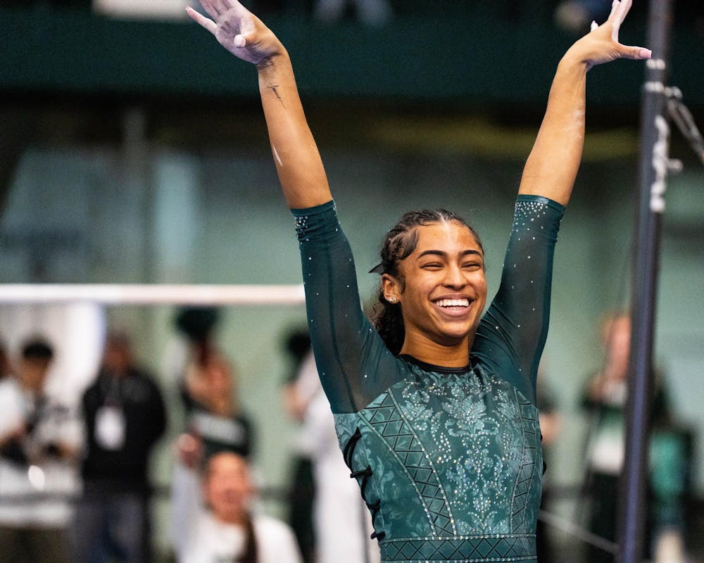 <p>MSU freshman Jazlynn Chism celebrates during the MSU vs. WMU vs. UMD gymnastics meet at Jenison Field House in East Lansing, on Feb. 15, 2026.</p>