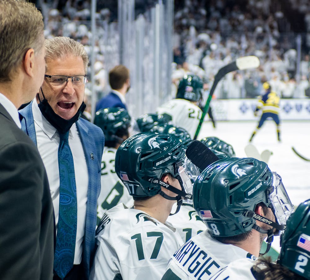 <p>Michigan State hockey Head Coach Danton Cole talks to his team as the Spartans try to find a way back in the game. The Wolverines defeated the Spartans 3-2 at Munn Ice Arena on Nov. 6, 2021.</p>