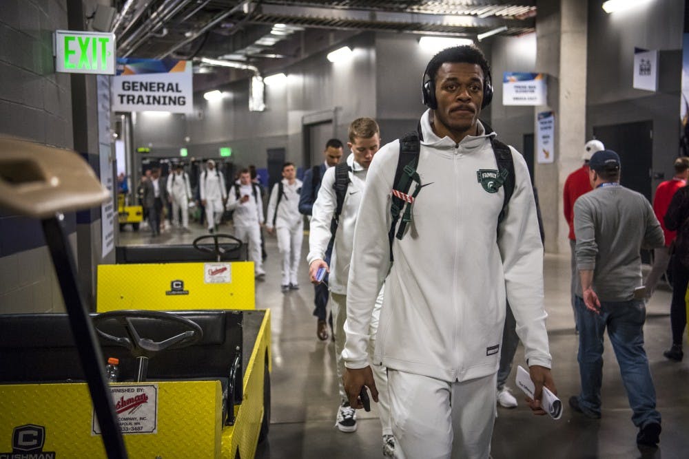 Sophomore forward Xavier Tillman (23) walks to the locker room before the men's basketball NCAA Final Four game against Texas Tech at U.S. Bank Stadium in Minneapolis on April 6, 2019. (Nic Antaya/The State News)