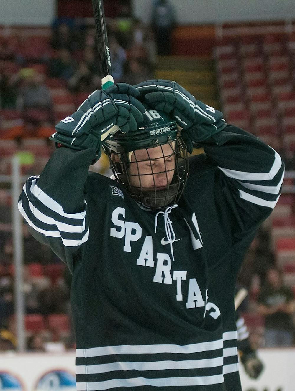 	<p>Senior forward Dean Chelios reacts to a shot on the Wolverine net during the game against Michigan on Jan. 23, 2014, at Joe Louis Arena in Detroit. The Spartans lost to the Wolverines, 2-1. Danyelle Morrow/The State News</p>