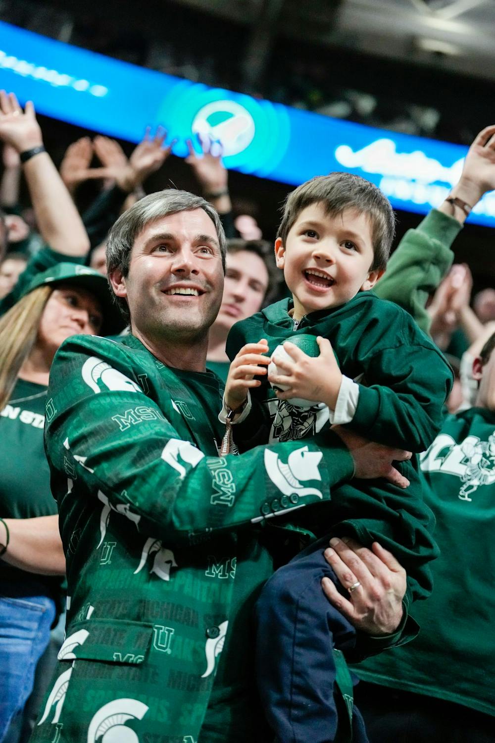 Fans celebrate during a game against the University of Washington at the Breslin Center in East Lansing, Michigan on January 9, 2025. Michigan State won 88-54. 