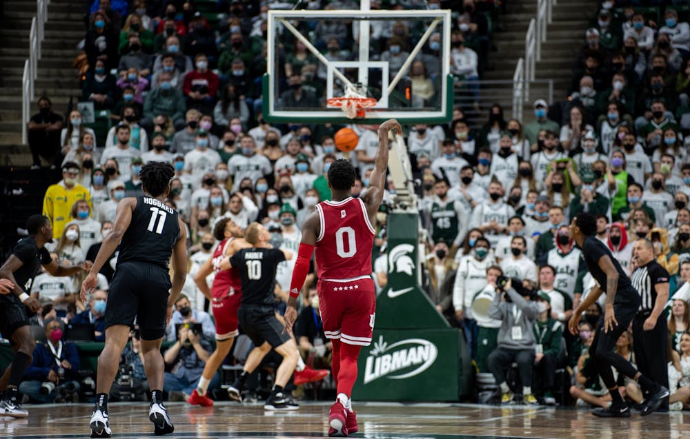 <p>Indiana&#x27;s senior guard Xavier Johnson (0) holds a pose after making a three-point shot during Michigan State&#x27;s victory over Indiana on Feb. 12, 2022.</p>