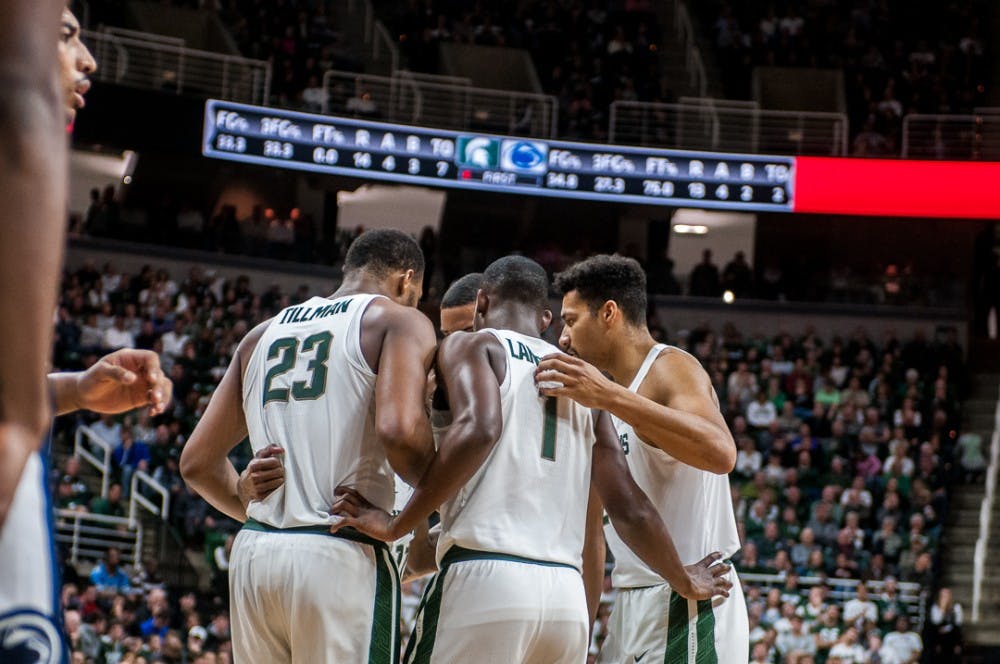 Spartans huddle up during the game against Penn State on Jan. 31, 2018 at Breslin Center. The Spartans beat the Nittany Lions 76-68. 