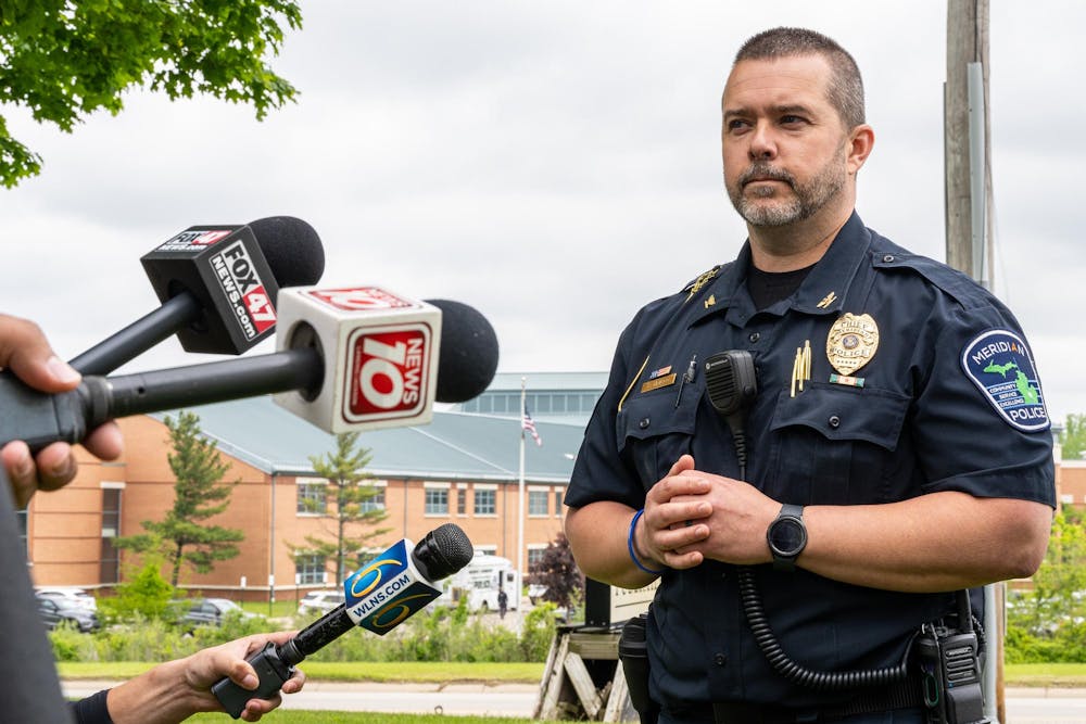 <p>Meridian Police Chief Rick Grillo speaks to the press following a "preventative lockdown" at Okemos High School on May 29, 2025.</p>