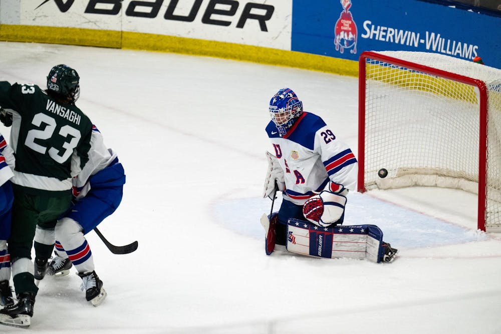 <p>The puck glances off the under-18 U.S. Men's National Team Development Program's goaltender Patrick Quinlan (29) at USA Hockey Arena in Plymouth, Michigan on Nov. 21, 2024. In front of a sold out crowd, the Spartans captured a convincing 6-2 victory, showcasing why they deserve their ranking of number two in the nation.</p>