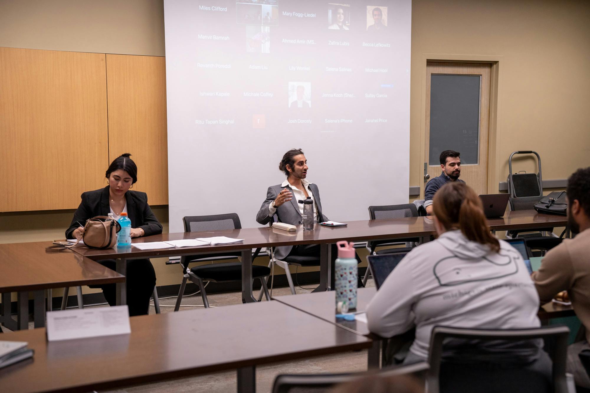 <p>Presidential candidates (left to right) Emily Hoyumpa, Zaaki Mandwee, and Shaurya Pandya, speaking at the ASMSU presidential debate, held at the Student Services Building on Apr. 17, 2023.</p>