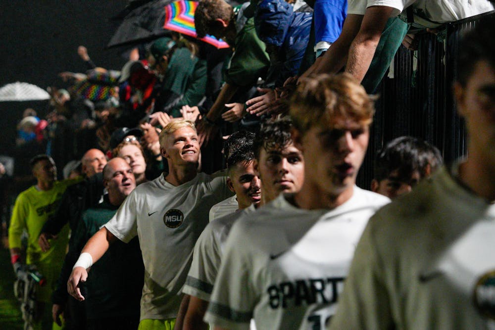 <p>Senior goalkeeper Andrew Nicholsen (1) celebrates with the fans after a win against University of Dayton at DeMartin Soccer Complex on Sept. 7, 2023.</p>
