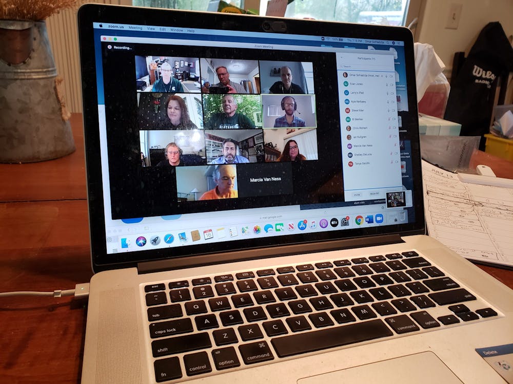 <p>Attendees appear on screen during the SNAA &quot;Meet the EIC&quot; Zoom event on July 16, 2020. Editor-in-Chief Evan Jones is in the second row from the top, far right box (highlighted in yellow and wearing a headset).</p>