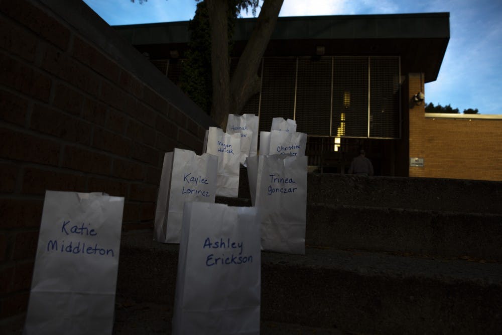 <p>POSSE lit 505 luminaries signifying the known survivors of Larry Nassar on Oct. 10, 2019 at the East Lansing Public Library.</p>