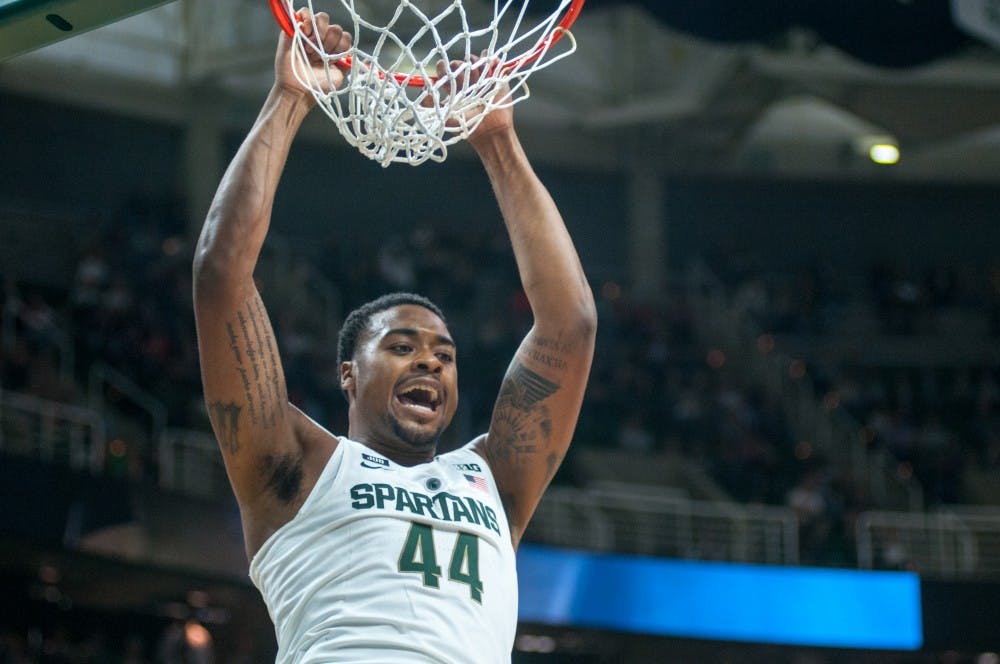 <p>Sophomore forward Nick Ward (44) dunks the ball during MSU's game against Ferris State on Oct. 26, 2017. The Spartans defeated the Bulldogs, 80-72.</p>