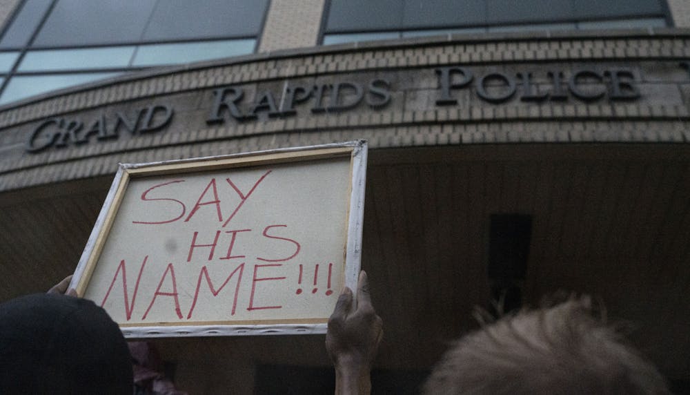 Hundreds gathered outside the Grand Rapids Police Department after the release of the footage of Patrick Lyoya’s death. A sign reads, "SAY HIS NAME!" outside the department building, which has become one of the many slogans for the movements against police brutality. - April 13, 2022.