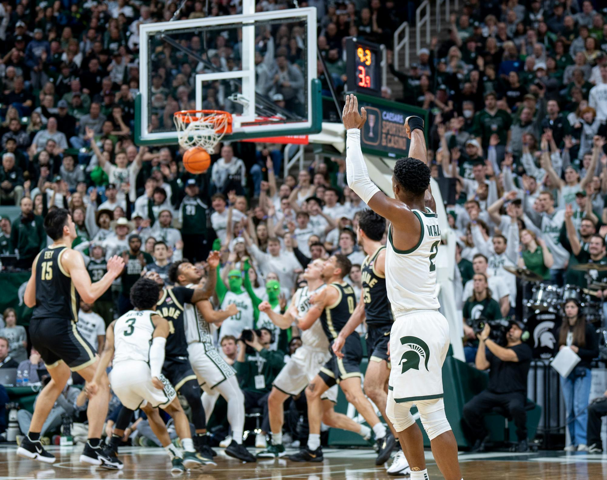 Senior guard Tyson Walker (2) makes a three pointer during a game against Purdue University at Breslin Center on Jan. 16, 2023. The Spartans fell to the Boilermakers with a score of 64-63. 