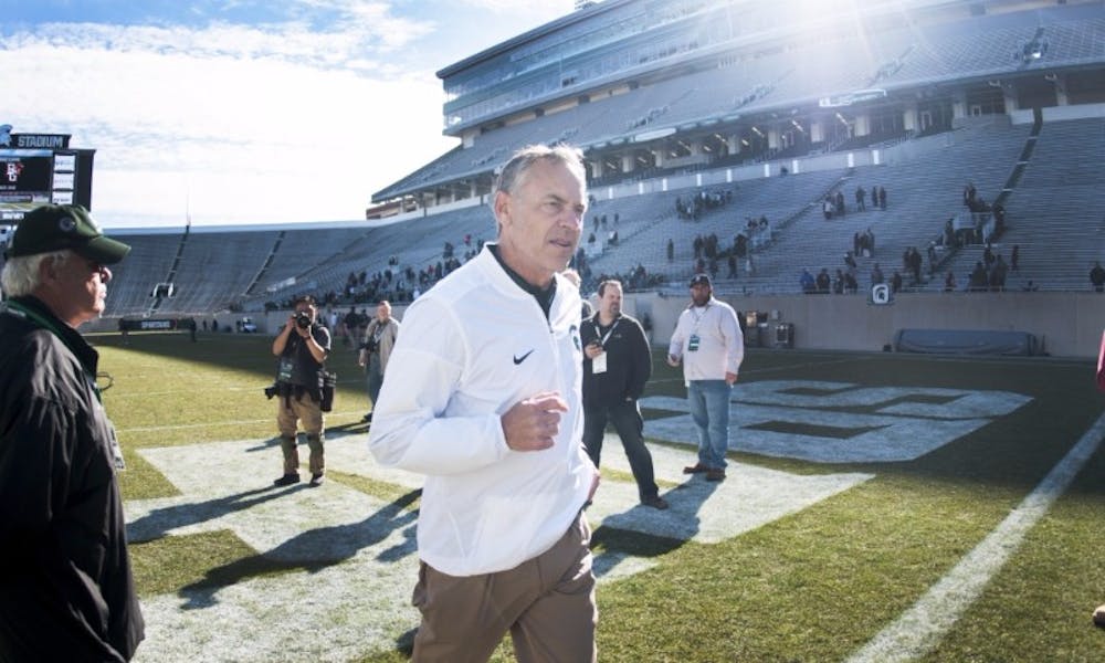<p><br>
Head coach Mark Dantonio leaves the stadium after the Green and White Spring Game on April 1, 2017 at Spartan Stadium. The White team defeated the Green team, 33-23.</p>