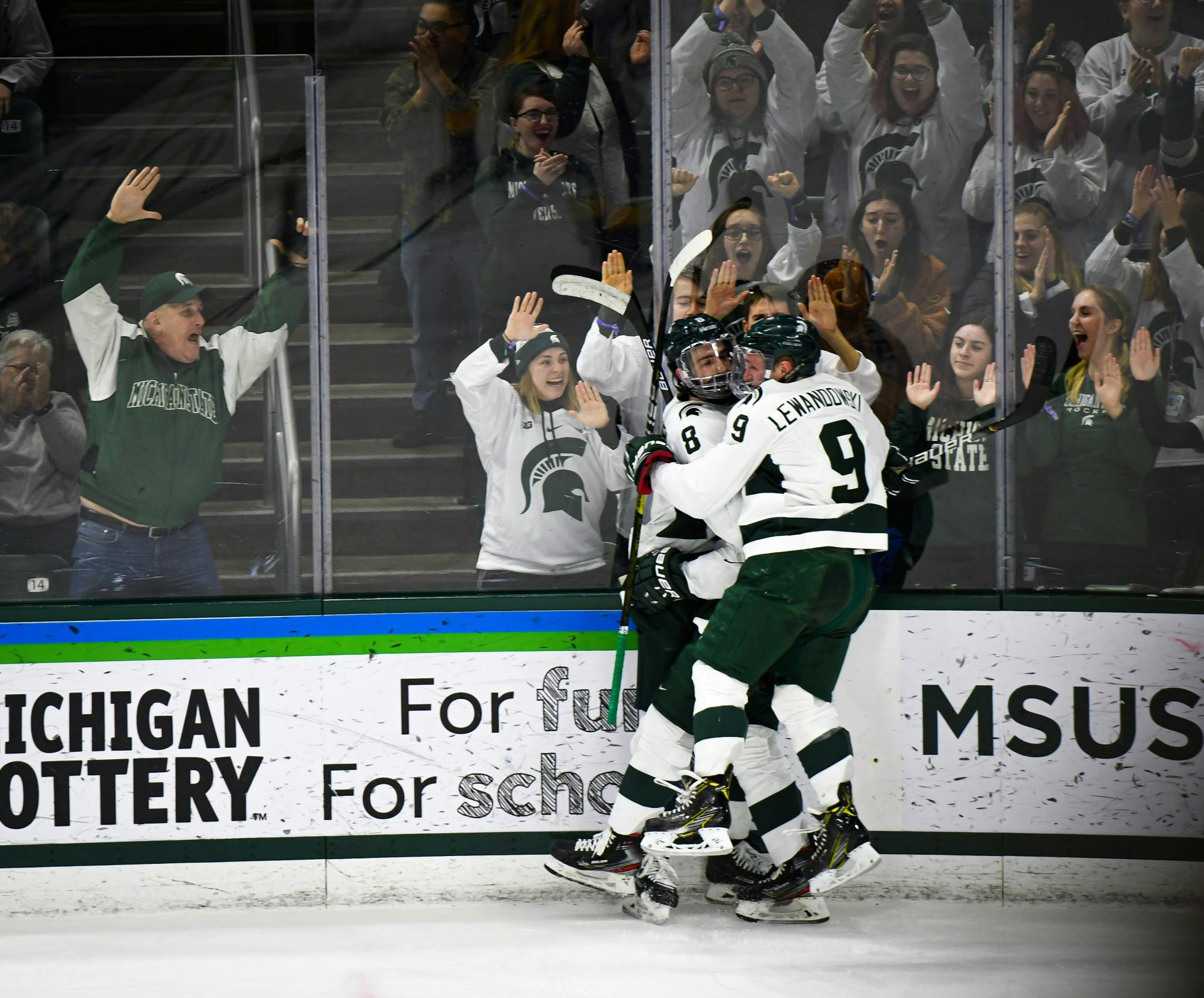 <p>MSU players celebrate another goal during the hockey game against Minnesota at the Munn Ice Arena on Jan. 10. The Spartans defeated the Golden Gophers 4-1. </p>