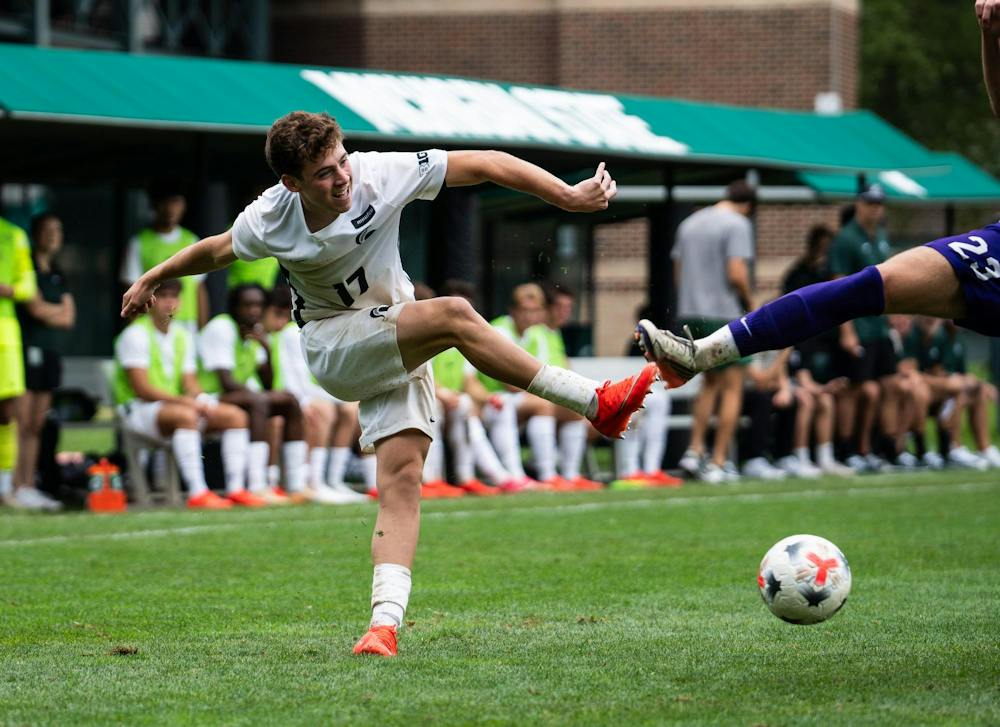 <p>MSU sophomore midfielder, Peter Soudan (17) strikes the ball as a Niagara player sticks their leg out to try and stop the ball at DeMartin Stadium in East Lansing, Mich., on Sunday, Aug 30, 2026.</p>