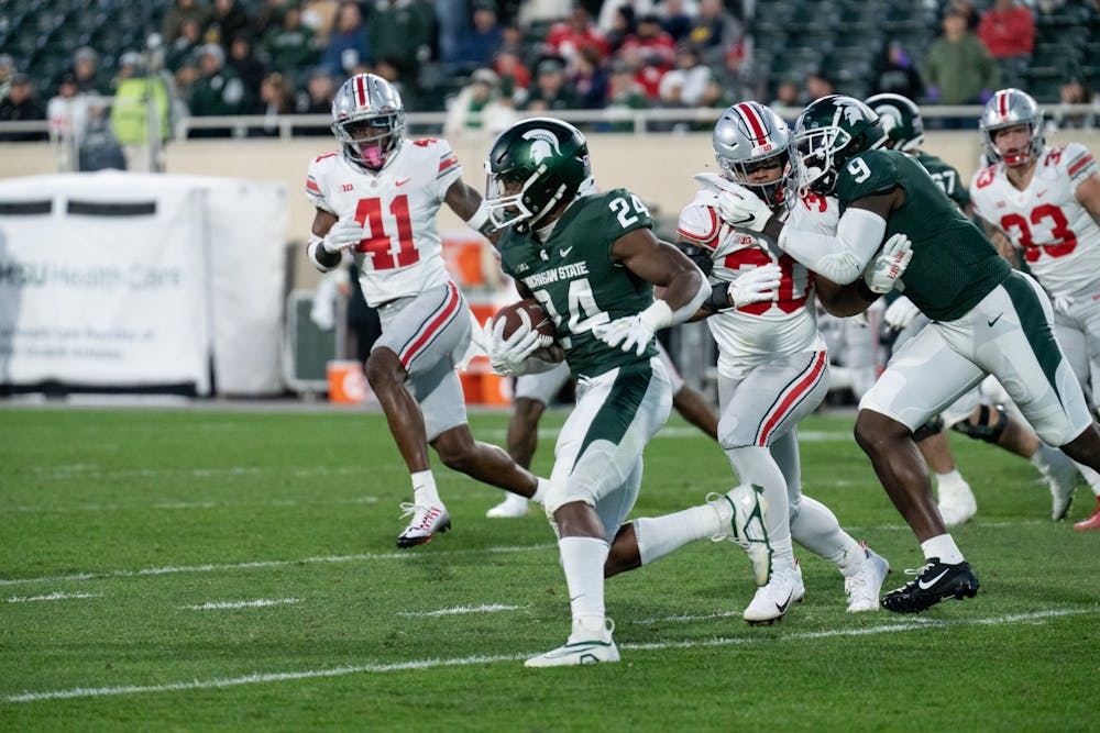 <p>Redshirt senior running back Elijah Collins, 24, rushes the ball down the field during the match versus the Buckeyes on Oct. 8, 2022.﻿</p>