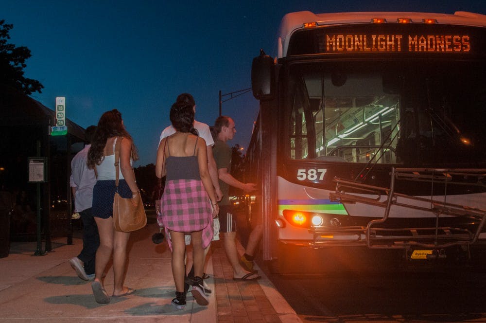Students board a CATA bus bound for Meijer on Aug. 29, 2016 at the Brody Complex. CATA buses provided free transportation for students during Moonlight Madness.