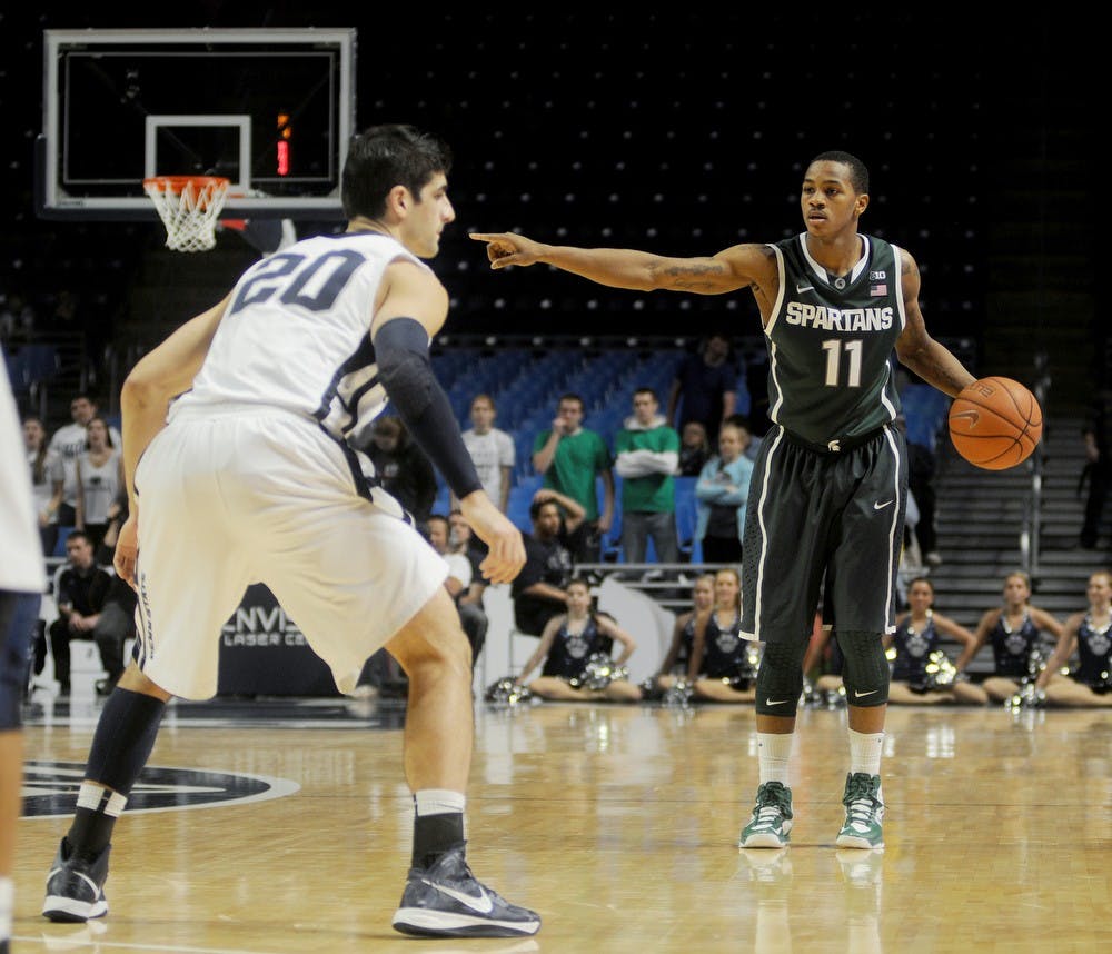 	<p>Junior guard Keith Appling directs the offense during Wednesday&#8217;s game against Penn State. The Spartans defeated the Nittany Lions despite the absence of two starters during the first half of the game.  David Reiling/The Daily Collegian</p>