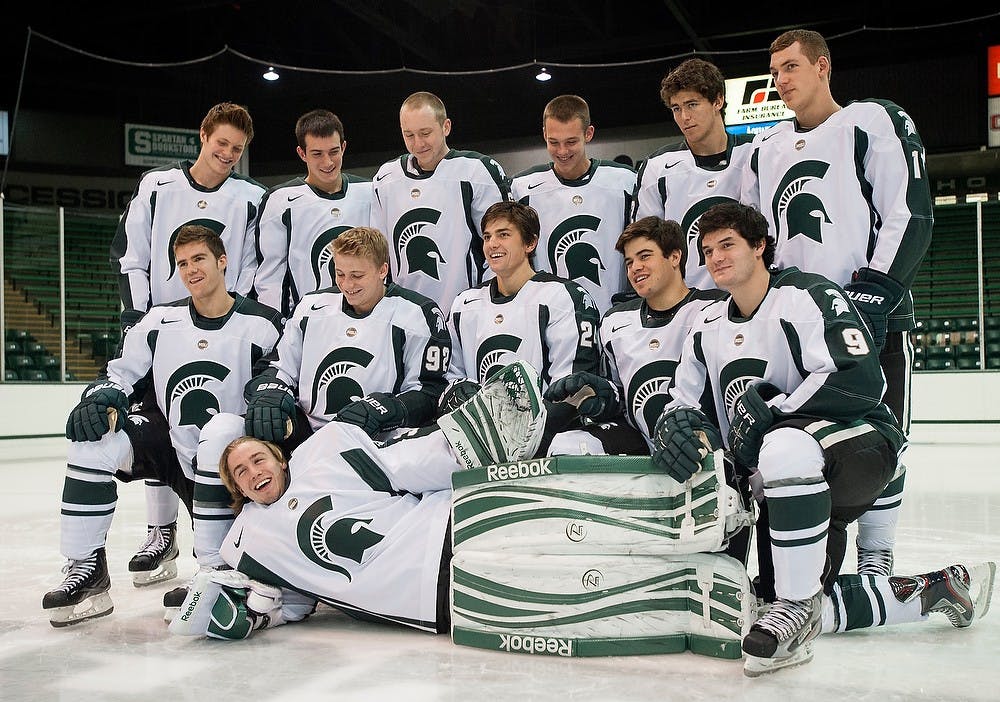 	<p>Freshmen and redshirt freshmen hockey players pose for a photo on Oct. 4 at Munn Ice Arena during media day. The Spartans kick off their season at 7:05 p.m.  today against Windsor at Munn Ice Arena. Justin Wan/The State News</p>
