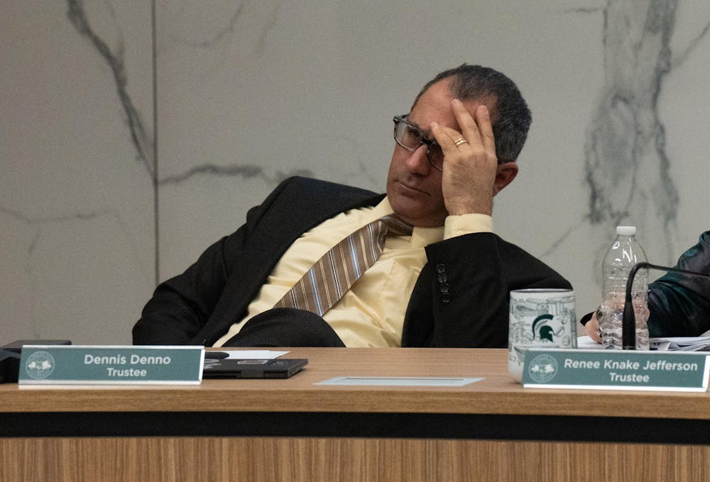 <p>Michigan State Trustee Dennis Denno reacts as sexual violence awareness advocate Brenda Tracy, who is a survivor of Mel Tucker's harassment criticizes him for not participating in an investigation into the leak of her identity during the Oct. 25, 2024 board meeting at the Hannah Administration building.</p>