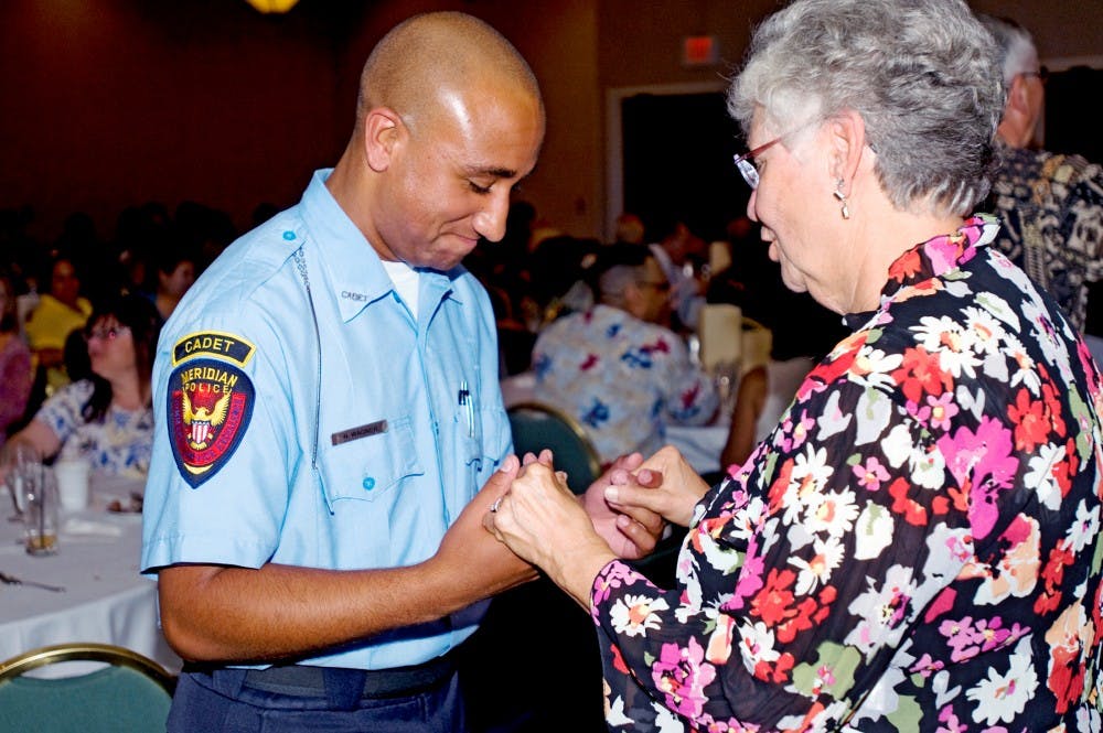 	<p>Josephine Bartha of Haslett teaches Meridian Township Police Cadet Nick Wagner a few old school dance moves Friday at the Marriott Hotel, 300 M.A.C Ave.  The sixth annual Senior Prom was held Friday to support the Ingham County <span class="caps">TRIAD</span>, a law enforcement and community partnership that works to promote quality of life for our elder population. </p>