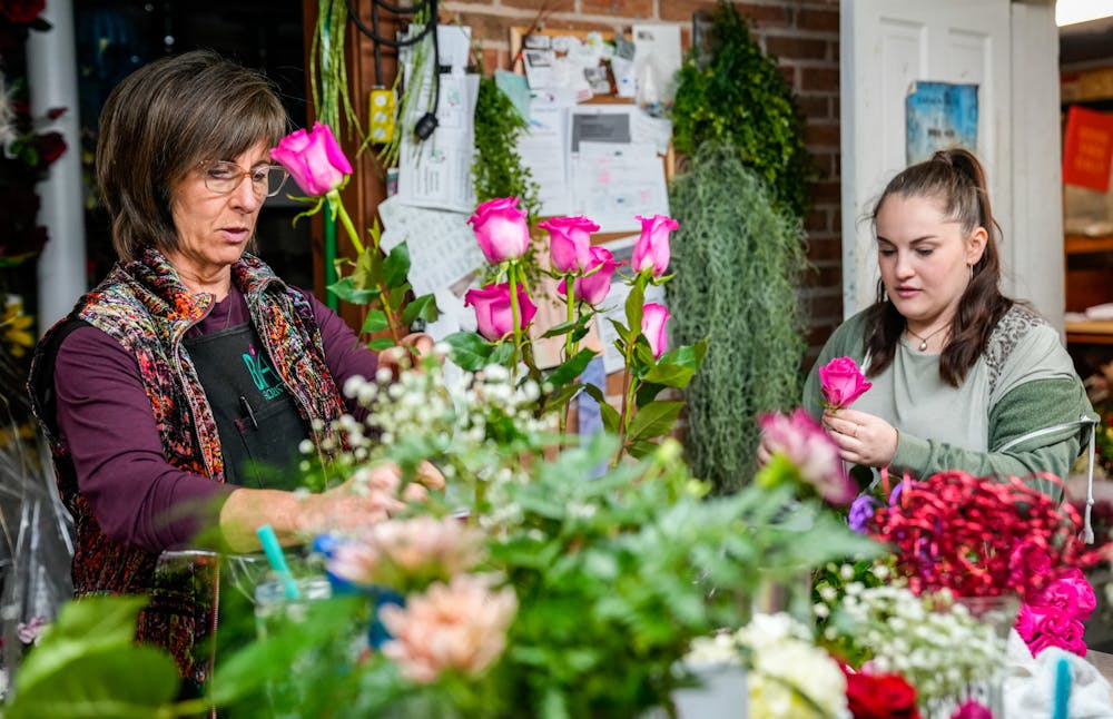 B/A Florist owner Laurie Van Ark works next to her daughter, Olivia Van Ark in the basement on Feb. 9, 2023. Olivia is the third generation in the family to work at the shop since her grandmother Barbara Ann Hollowick founded it in 1979.