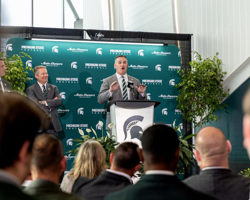MSU's new football HC Pat Fitzgerald jokes with the crowd in the Tom Izzo football building in East Lansing, MI on Dec. 2, 2025.