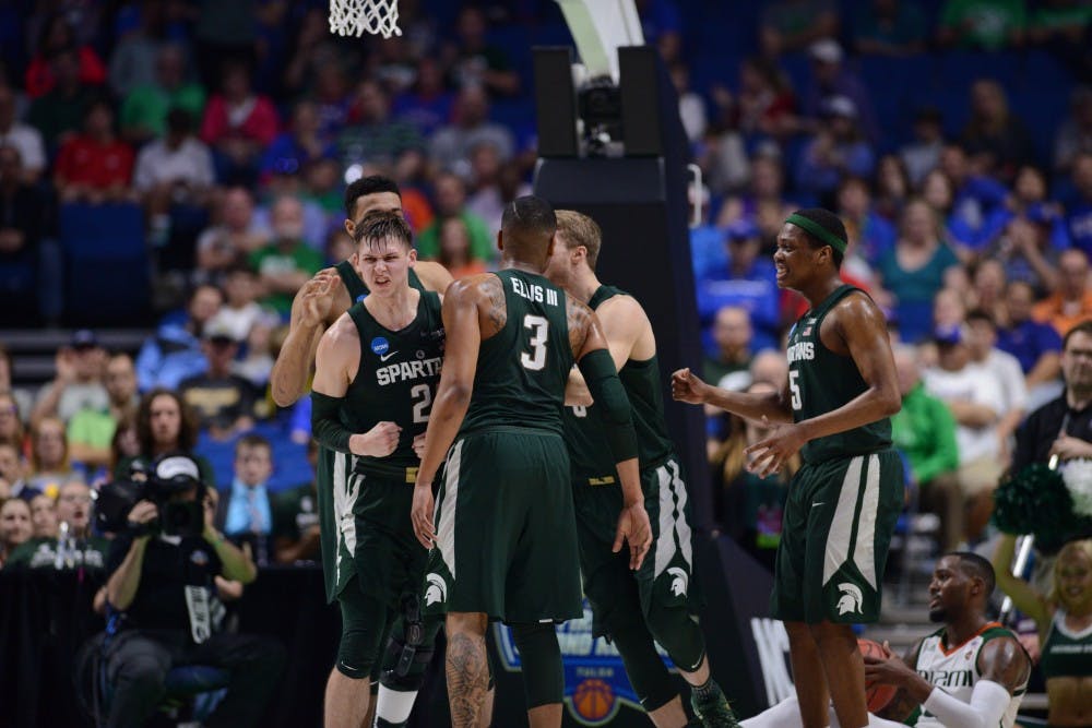 Sophomore guard Matt McQuaid (20) expresses emotion during the first half of the game against University of Miami (Fla.) in the first round of the Men's NCAA Tournament on March 17, 2017 at  at the BOK Center in Tulsa, Okla.The Spartans defeated  the Hurricanes, 78-58.